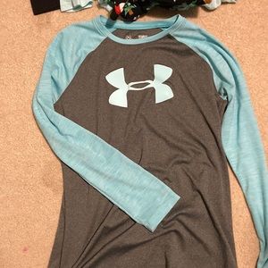 Under armor long sleeved kids athletic tee. Youth large lightly used.